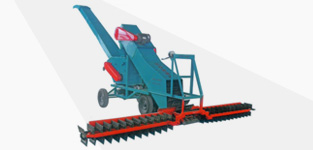 Grain scraping and loading machine